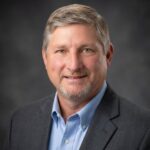 Author Larry Burklow Jr - Professional headshot for Downsize with Dignity